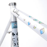 A Colnago Mapei Team frame, in blue and white, up close shot of the top tube