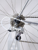 Flanders white 54cm bike's cassette and derailleur closeup