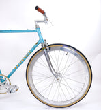 Peugeot Blue 57cm side profile of front half of bike.