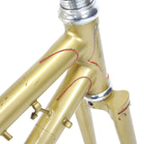 Mercian step through gold lugs and red lug lining