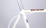 Motobecane MBK Trainer Road Bike, White 57cm, close up of seat clamp and "Motobecane" logo.